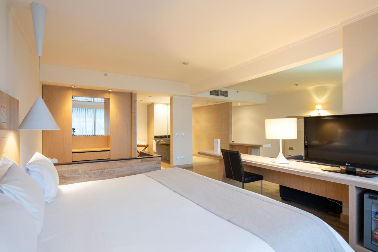 Wyndham Concepcion Pettra Hotel Exterior photo A room at the hotel