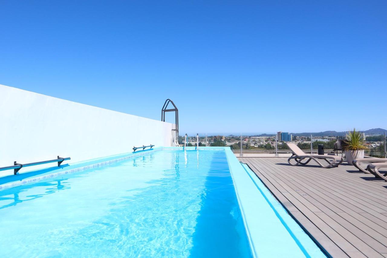 Wyndham Concepcion Pettra Hotel Exterior photo Rooftop pool