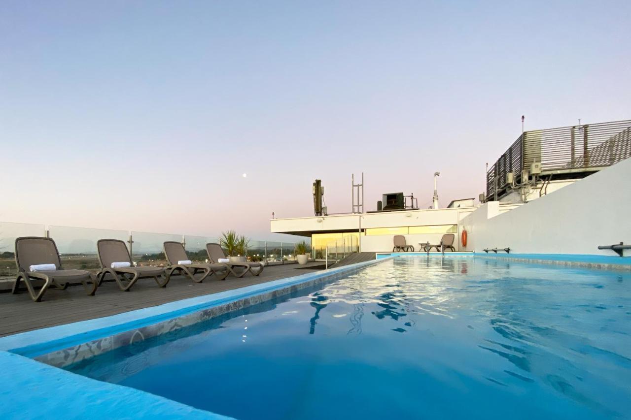 Wyndham Concepcion Pettra Hotel Exterior photo Rooftop pool